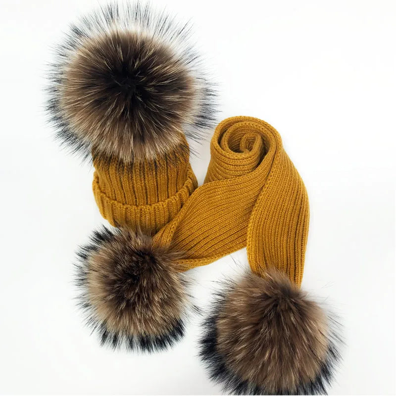 Thin scarf with fur pom moms on the ends. Available in a variety of colors.