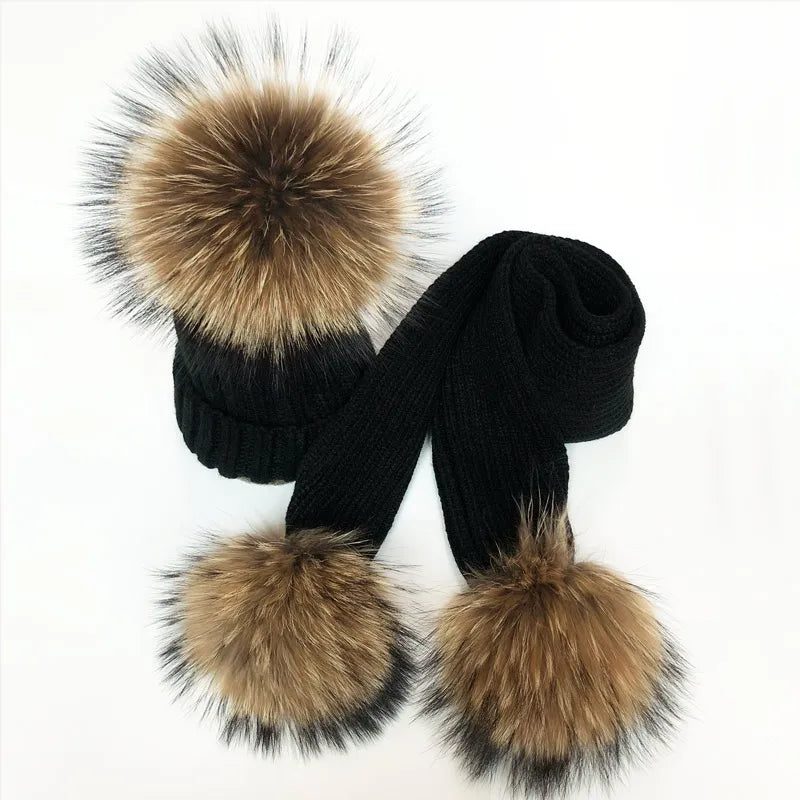 Thin scarf with fur pom moms on the ends. Available in a variety of colors.