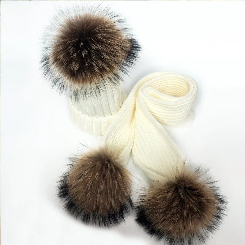 Thin scarf with fur pom moms on the ends. Available in a variety of colors.