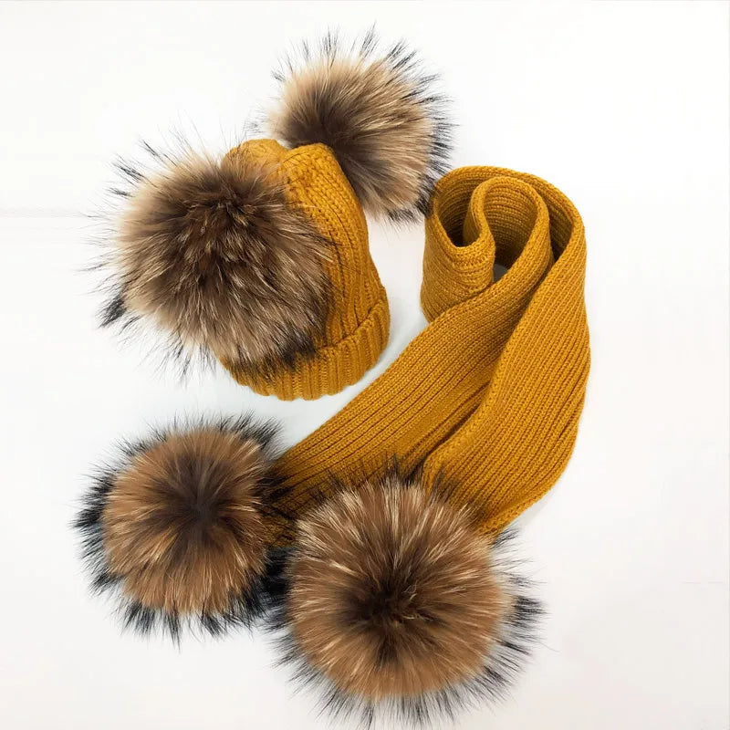 Thin scarf with fur pom moms on the ends. Available in a variety of colors.