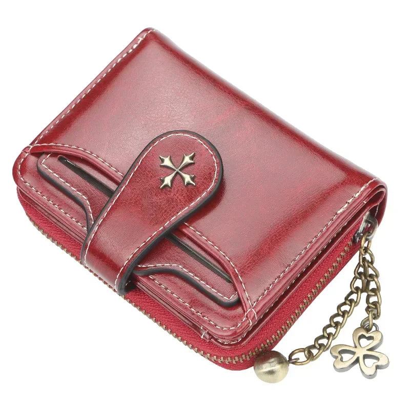 Synthetic Leather wallet with clasp and chain on zipper. Available in a variety of colors