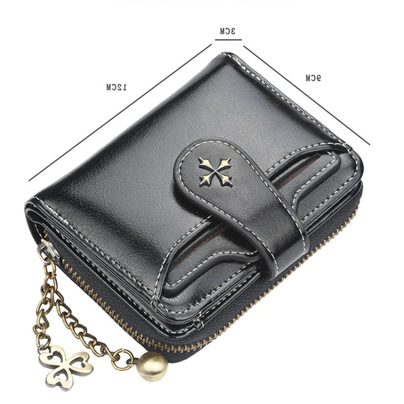 Synthetic Leather wallet with clasp and chain on zipper. Available in a variety of colors