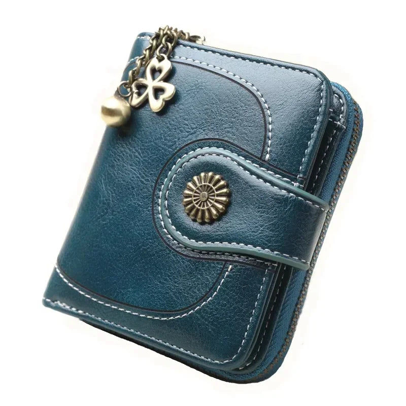 Synthetic Leather wallet with clasp and chain on zipper. Available in a variety of colors