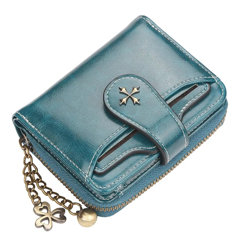 Synthetic Leather wallet with clasp and chain on zipper. Available in a variety of colors