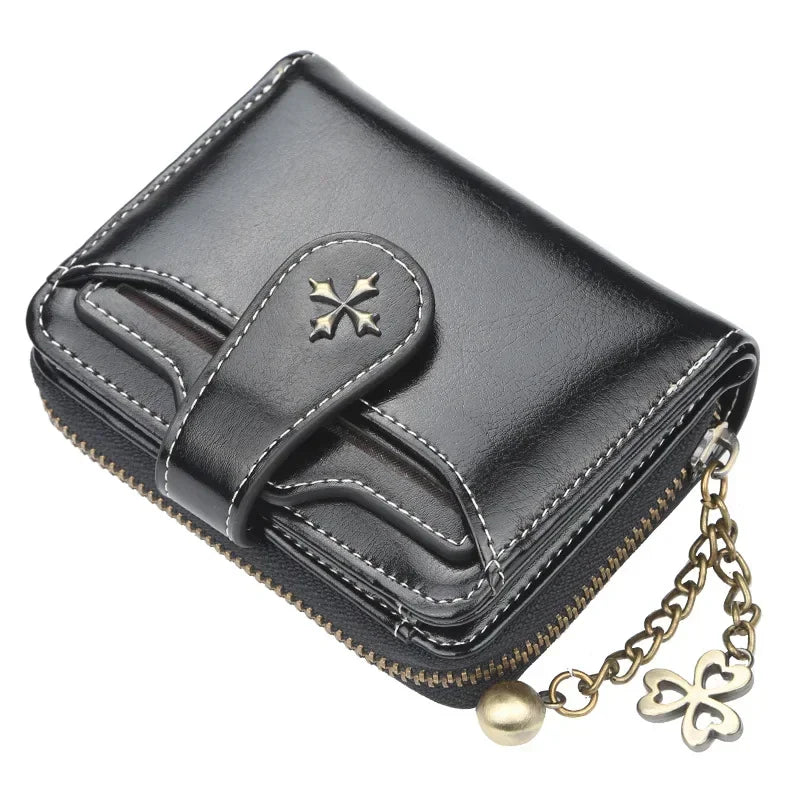 Synthetic Leather wallet with clasp and chain on zipper. Available in a variety of colors