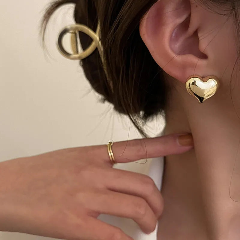 Sleek Heart Shaped Gold Earrings