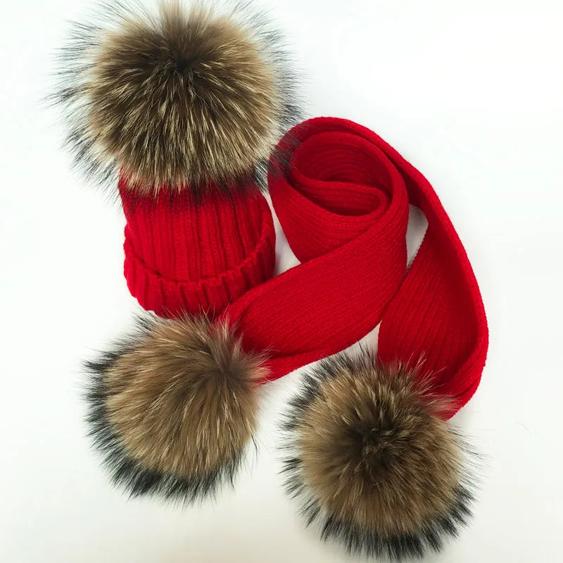 Thin scarf with fur pom moms on the ends. Available in a variety of colors.