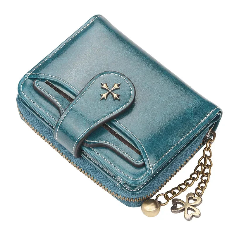 Synthetic Leather wallet with clasp and chain on zipper. Available in a variety of colors