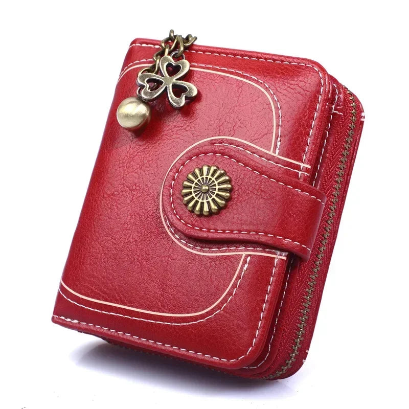 Synthetic Leather wallet with clasp and chain on zipper. Available in a variety of colors