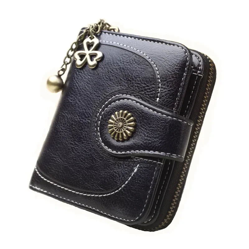 Synthetic Leather wallet with clasp and chain on zipper. Available in a variety of colors