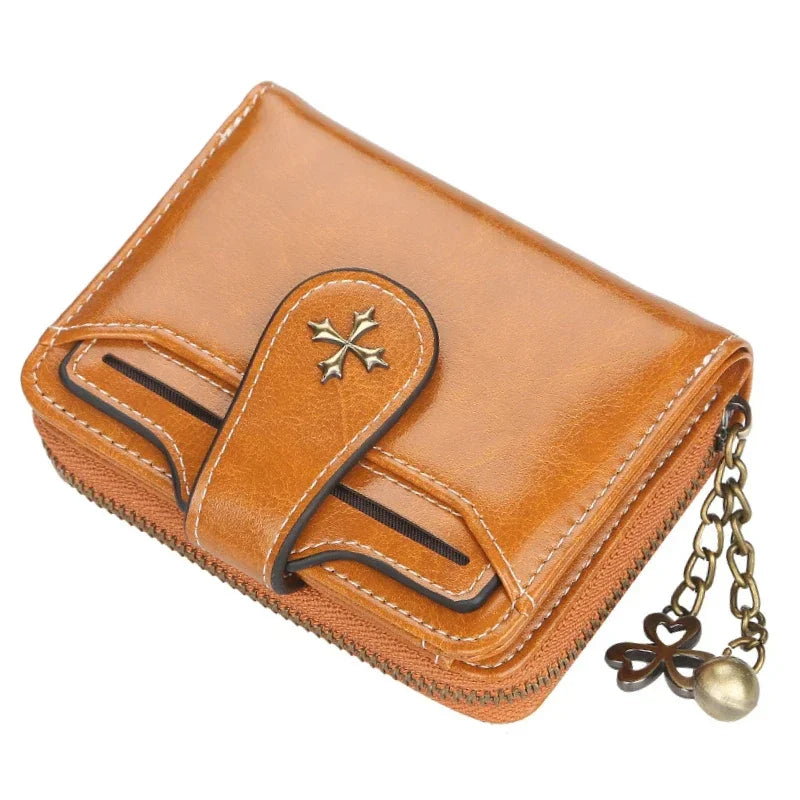 Synthetic Leather wallet with clasp and chain on zipper. Available in a variety of colors