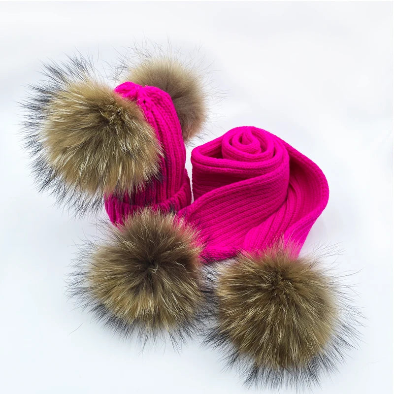 Thin scarf with fur pom moms on the ends. Available in a variety of colors.