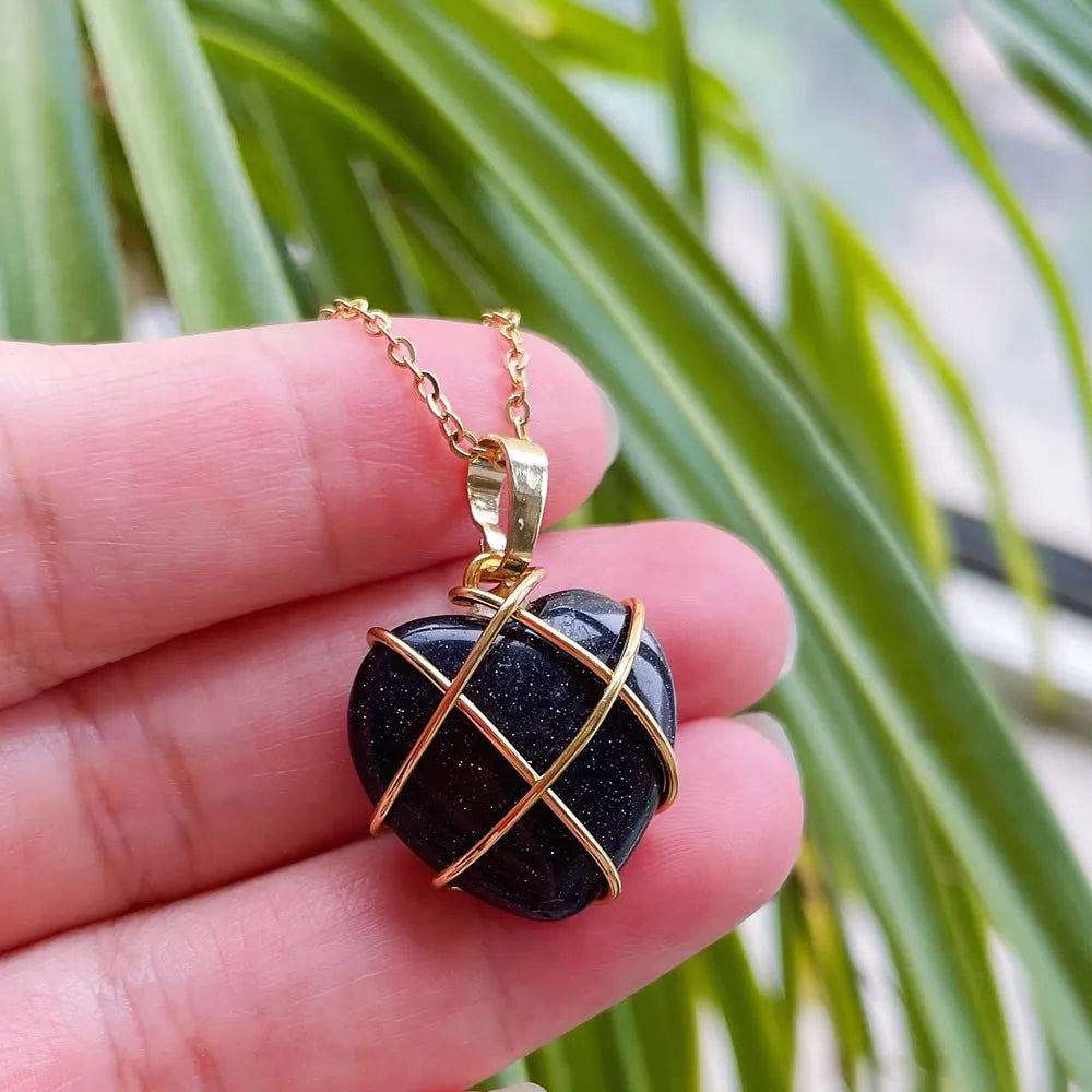 Wire Wrapped Natural Crystal Pendant Choker Heart Design showing Blue Goldstone